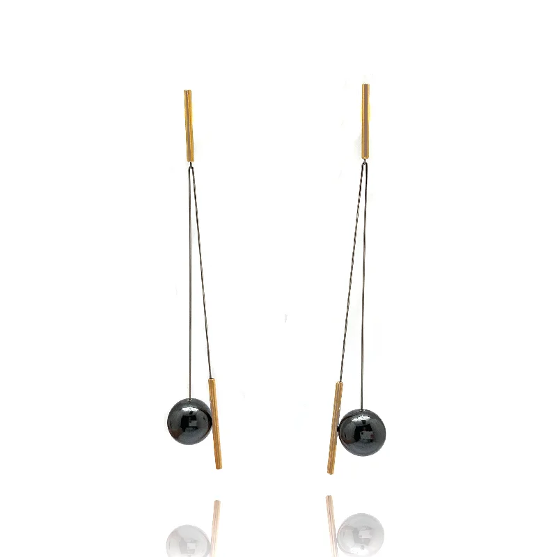 Swinging Gold And Hematite Sphere Earrings